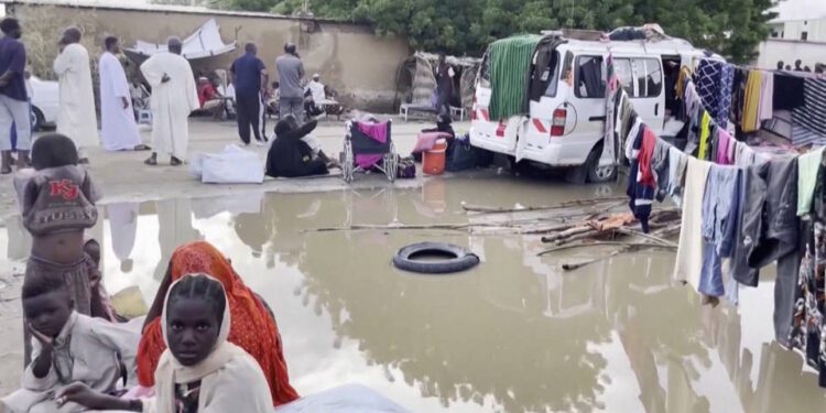 What has caused the cholera outbreak in Sudan?